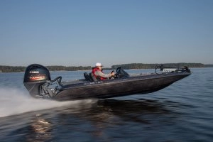 zx150 bass boat running across lake