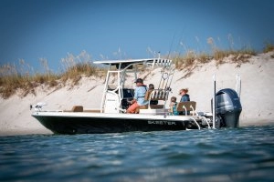 family hanging out in boat