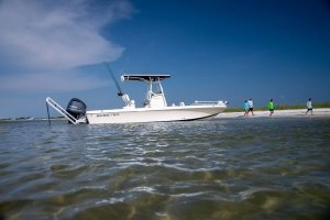 beached boat with anchor down