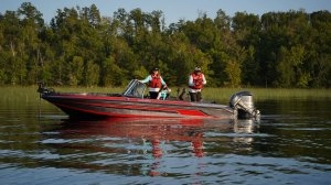 side image 2 people in boat